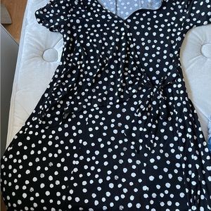 Cute little mid-calf faux wrap dress.